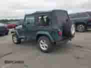 2001 Jeep Wrangler Sahara z VIN 1J4FA59S21P349009, wystawiony jako Copart lot #64310995 z przebiegiem 87 642 mil mil oraz Czysty tytuł • Clean title. Historia ofert i sprzedaży dostępna na DreamBid. Obrazek 2.