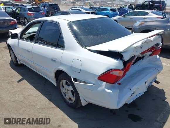 1999 Honda Accord EX with VIN 1HGCG6679XA059196, listed as a IAAI auction lot 43042767 with 256,679 mi miles and . Bid and sale history available at DreamBid. Image 3.