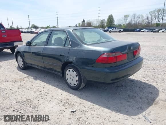 2000 Honda Accord LX z VIN 1HGCG5644YA009128, wystawiony jako IAAI lot #42066193 z przebiegiem 171 219 mil mil oraz . Historia ofert i sprzedaży dostępna na DreamBid. Obrazek 3.