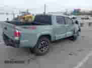 2023 Toyota Tacoma SR z VIN 3TMCZ5ANXPM631484, wystawiony jako IAAI lot #43316224 z przebiegiem 31 823 mil mil oraz . Historia ofert i sprzedaży dostępna na DreamBid. Obrazek 4.