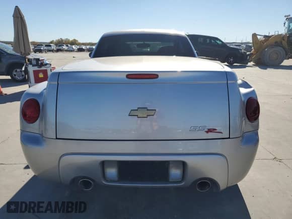 2005 Chevrolet SSR LS с VIN 1GCES14H75B114899, выставлен на аукционе Copart как лот 84464164 с пробегом 99 359 миль миль и Списание • Salvage title. История ставок и продаж доступна на DreamBid. Изображение 6.