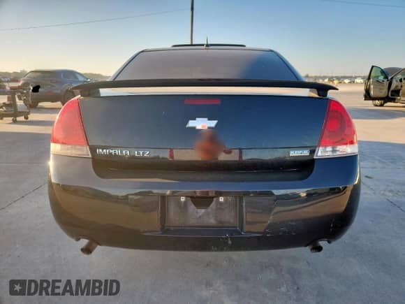 2012 Chevrolet Impala LTZ with VIN 2G1WC5E35C1257576, listed as a Copart auction lot 82001785 with 174,047 mi miles and Salvage title. Bid and sale history available at DreamBid. Image 6.