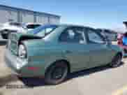 2005 Hyundai Accent GLS z VIN KMHCG45CX5U609093, wystawiony jako Copart lot #81697905 z przebiegiem 144 055 mil mil oraz Szkoda całkowita • Salvage title. Historia ofert i sprzedaży dostępna na DreamBid. Obrazek 3.