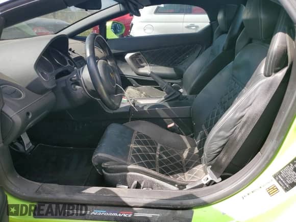 2013 Lamborghini Gallardo with VIN ZHWGU6BZ9DLA12793, listed as a Copart auction lot 77525804 with 11,777 mi miles and Salvage title. Bid and sale history available at DreamBid. Image 7.
