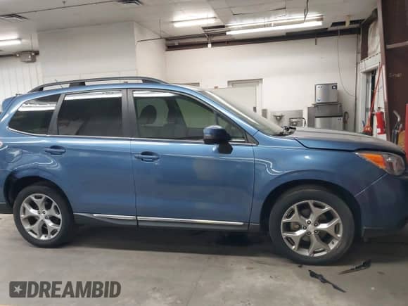 2015 Subaru Forester Touring with VIN JF2SJAUC9FH807385, listed as a IAAI auction lot 43508096 with 103,862 mi miles and . Bid and sale history available at DreamBid. Image 14.