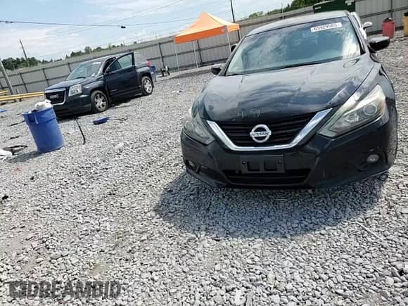 2016 Nissan Altima SR z VIN 1N4AL3AP4GC218501, wystawiony jako Copart lot #65929585 z przebiegiem 188 976 mil mil oraz Szkoda całkowita • Salvage title. Historia ofert i sprzedaży dostępna na DreamBid. Obrazek 13.