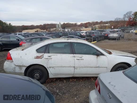 2007 Chevrolet Impala Police Unmarked Police with VIN 2G1WS58R079292150, listed as a IAAI auction lot 40882064 with 9 mi miles and . Bid and sale history available at DreamBid. Image 13.