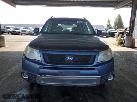 2009 Subaru Forester X with VIN JF2SH63659H740678, listed as a Copart auction lot 80529945 with 217,044 mi miles and Salvage title. Bid and sale history available at DreamBid. Image 5.