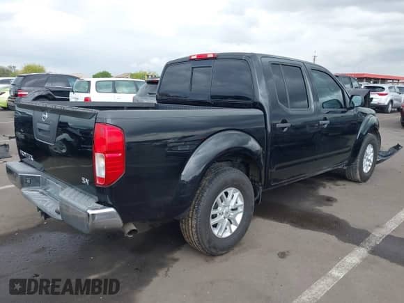 2014 Nissan Frontier Desert Runner z VIN 1N6AD0ER0EN719742, wystawiony jako IAAI lot #42202608 z przebiegiem 126 796 mil mil oraz . Historia ofert i sprzedaży dostępna na DreamBid. Obrazek 4.