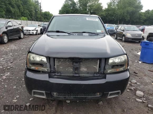 2006 Chevrolet TrailBlazer LT z VIN 1GNET13HX62221470, wystawiony jako Copart lot #64403435 z przebiegiem 163 850 mil mil oraz Szkoda całkowita • Salvage title. Historia ofert i sprzedaży dostępna na DreamBid. Obrazek 5.
