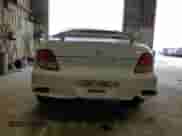 2000 Hyundai Tiburon with VIN KMHJG25F1YU217419, listed as a Copart auction lot 54772515 with 155,023 mi miles and Salvage title. Bid and sale history available at DreamBid. Image 6.
