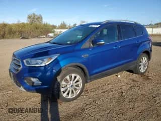 2017 Ford Escape Titanium с VIN 1FMCU9J96HUA10292, выставлен на аукционе Copart как лот 86331325 с пробегом 143 759 миль миль и Чистый • Clean title. История ставок и продаж доступна на DreamBid. Изображение 1.