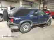 2001 Chevrolet Blazer LS z VIN 1GNCT18W01K143093, wystawiony jako Copart lot #82650514 z przebiegiem Nie podano mil oraz Szkoda całkowita • Salvage title. Historia ofert i sprzedaży dostępna na DreamBid. Obrazek 3.