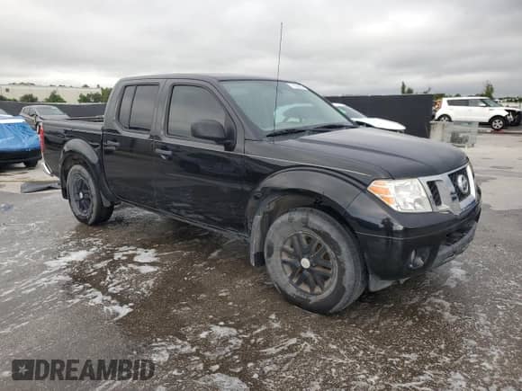 2021 Nissan Frontier SV with VIN 1N6ED0EA8MN710622, listed as a Copart auction lot 71856925 with 57,703 mi miles and Non repairable. Bid and sale history available at DreamBid. Image 4.