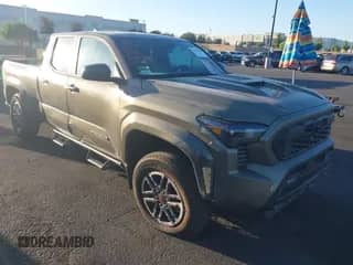 2024 Toyota Tacoma SR5 with VIN 3TMLB5JN9RM057547, listed as a IAAI auction lot 42865640 with 28,049 mi miles and . Bid and sale history available at DreamBid. Image 1.