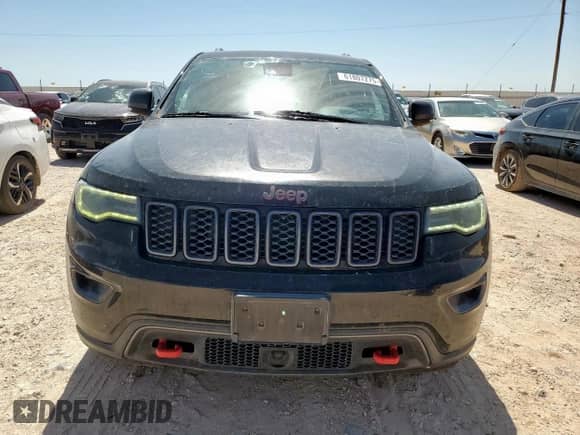 2017 Jeep Grand Cherokee Trailhawk with VIN 1C4RJFLTXHC962121, listed as a Copart auction lot 61807275 with 145,464 mi miles and Clean title. Bid and sale history available at DreamBid. Image 5.