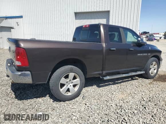 2011 Ram 1500 Big Horn с VIN 1D7RV1GT5BS666587, выставлен на аукционе Copart как лот 66126325 с пробегом 189 527 миль миль и Списание • Salvage title. История ставок и продаж доступна на DreamBid. Изображение 3.