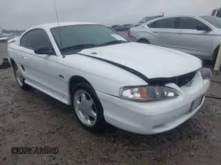 1996 Ford Mustang GT z VIN 1FALP42X4TF229346, wystawiony jako IAAI lot #42225102 z przebiegiem 151 275 mil mil oraz . Historia ofert i sprzedaży dostępna na DreamBid. Obrazek 1.
