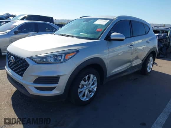 2021 Hyundai Tucson Value with VIN KM8J33A48MU329389, listed as a IAAI auction lot 43119462 with 103,981 mi miles and . Bid and sale history available at DreamBid. Image 2.