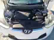 2013 Hyundai Veloster w/Gray Int z VIN KMHTC6AD3DU171621, wystawiony jako Copart lot #80663404 z przebiegiem Nie podano mil oraz Czysty tytuł • Clean title. Historia ofert i sprzedaży dostępna na DreamBid. Obrazek 11.