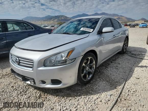 2013 Nissan Maxima S z VIN 1N4AA5APXDC801894, wystawiony jako Copart lot #80569365 z przebiegiem 107 588 mil mil oraz Szkoda całkowita • Salvage title. Historia ofert i sprzedaży dostępna na DreamBid. Obrazek 1.