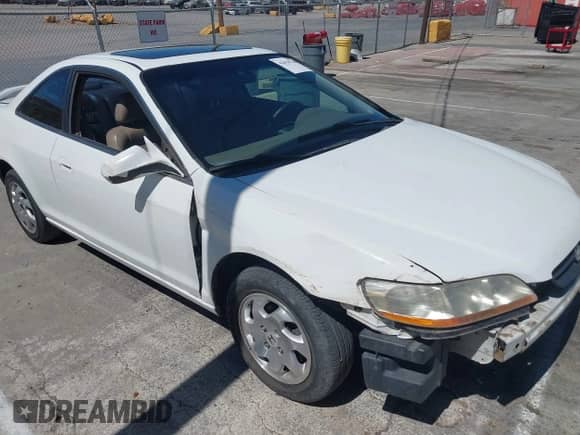 1998 Honda Accord EX with VIN 1HGCG3270WA010245, listed as a IAAI auction lot 42628230 with 283,906 mi miles and . Bid and sale history available at DreamBid. Image 20.