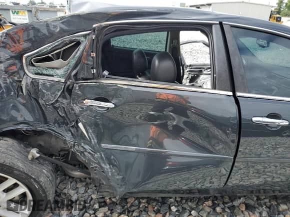 2013 Chevrolet Impala LTZ z VIN 2G1WC5E3XD1175652, wystawiony jako Copart lot #84699035 z przebiegiem 134 389 mil mil oraz Szkoda całkowita • Salvage title. Historia ofert i sprzedaży dostępna na DreamBid. Obrazek 10.