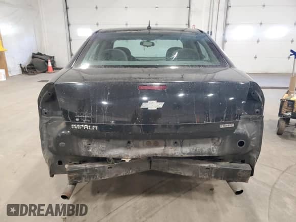 2014 Chevrolet Impala LS with VIN 2G1WA5E31E1167849, listed as a Copart auction lot 89865415 with 137,129 mi miles and Salvage title. Bid and sale history available at DreamBid. Image 6.