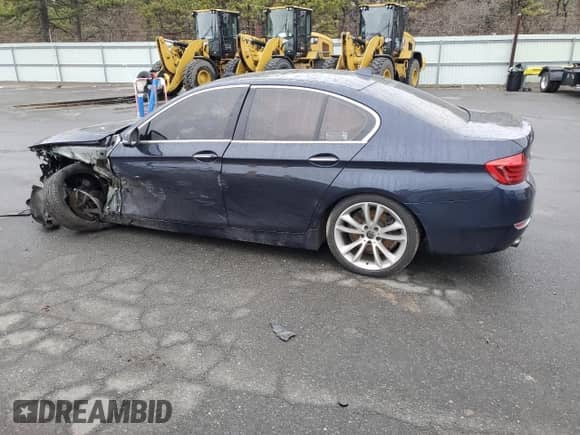 2014 BMW 5 Series 535i xDrive with VIN WBA5B3C53ED534986, listed as a Copart auction lot 51571485 with 115,166 mi miles and Salvage title. Bid and sale history available at DreamBid. Image 2.