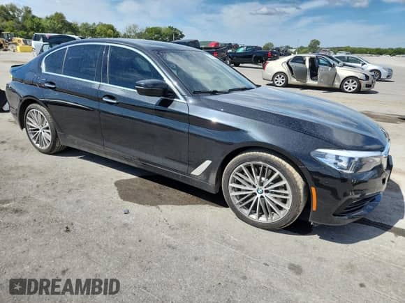 2018 BMW 5 Series 540i with VIN WBAJE5C55JWA95888, listed as a Copart auction lot 70040025 with 68,306 mi miles and Salvage title. Bid and sale history available at DreamBid. Image 4.