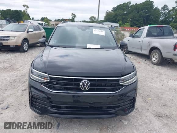 2022 Volkswagen Tiguan SE R-Line Black с VIN 3VV8B7AX7NM103374, выставлен на аукционе IAAI как лот 43190799 с пробегом 56 413 миль миль и . История ставок и продаж доступна на DreamBid. Изображение 12.