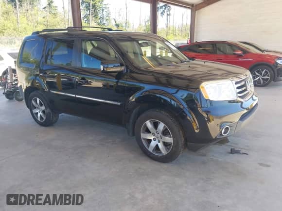 2012 Honda Pilot Touring with VIN 5FNYF4H99CB075099, listed as a IAAI auction lot 42674383 with 203,684 mi miles and . Bid and sale history available at DreamBid. Image 1.