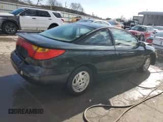 2001 Saturn SC с VIN 1G8ZR12721Z295252, выставлен на аукционе Copart как лот 82608074 с пробегом 137 076 миль миль и Списание • Salvage title. История ставок и продаж доступна на DreamBid. Изображение 3.