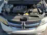 2014 Dodge Journey SXT with VIN 3C4PDCBB7ET119077, listed as a Copart auction lot 68337365 with 99,909 mi miles and Salvage title. Bid and sale history available at DreamBid. Image 11.