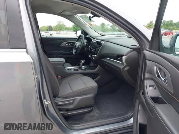 2021 Chevrolet Traverse LS with VIN 1GNEVFKW5MJ138247, listed as a IAAI auction lot 42347734 with 33,895 mi miles and . Bid and sale history available at DreamBid. Image 5.