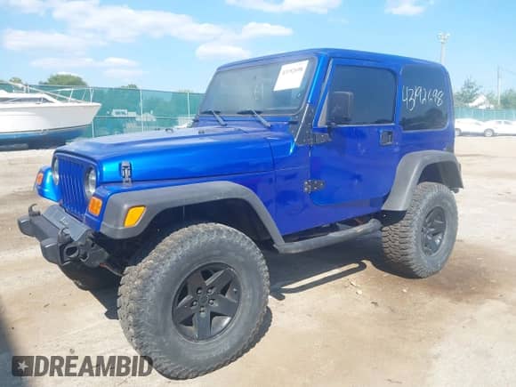 2000 Jeep Wrangler Sport with VIN 1J4FA49S0YP735660, listed as a IAAI auction lot 43192698 with Not provided miles and . Bid and sale history available at DreamBid. Image 2.