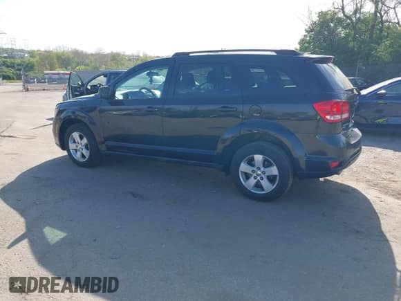 2012 Dodge Journey SXT z VIN 3C4PDDBGXCT160348, wystawiony jako IAAI lot #42096075 z przebiegiem 135 095 mil mil oraz . Historia ofert i sprzedaży dostępna na DreamBid. Obrazek 3.