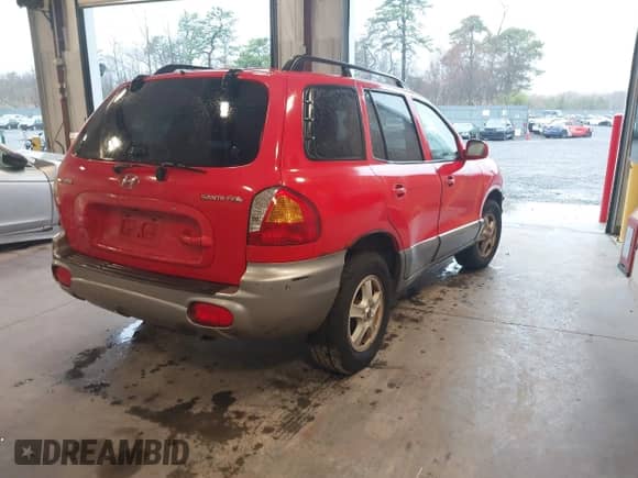 2003 Hyundai Santa Fe with VIN KM8SB12B83U510161, listed as a IAAI auction lot 42004585 with 98,106 mi miles and . Bid and sale history available at DreamBid. Image 4.
