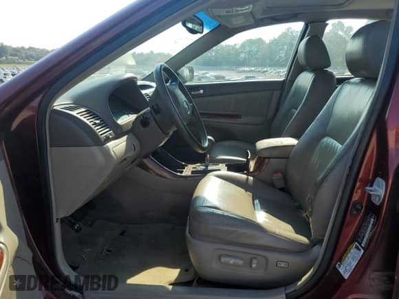 2004 Toyota Camry LE with VIN 4T1BF32K54U077710, listed as a Copart auction lot 80057695 with Not provided miles and Salvage title. Bid and sale history available at DreamBid. Image 7.