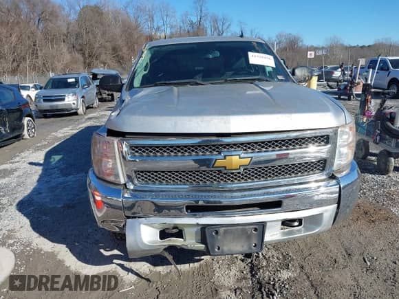 2013 Chevrolet Silverado 1500 LT with VIN 3GCPKSEA3DG237766, listed as a IAAI auction lot 41328496 with 105,466 mi miles and . Bid and sale history available at DreamBid. Image 12.