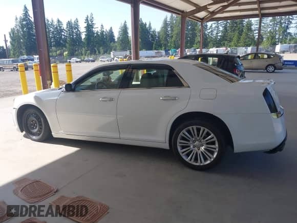 2013 Chrysler 300 C with VIN 2C3CCAET4DH504862, listed as a IAAI auction lot 42403456 with 77,468 mi miles and . Bid and sale history available at DreamBid. Image 15.