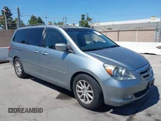 2006 Honda Odyssey Touring z VIN 5FNRL38856B110871, wystawiony jako IAAI lot #42649237 z przebiegiem 206 948 mil mil oraz . Historia ofert i sprzedaży dostępna na DreamBid. Obrazek 1.