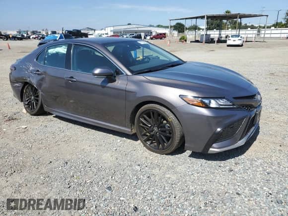 2023 Toyota Camry Hybrid XSE с VIN 4T1K31AK2PU601303, выставлен на аукционе Copart как лот 81736455 с пробегом 23 901 миль миль и Списание • Salvage title. История ставок и продаж доступна на DreamBid. Изображение 4.