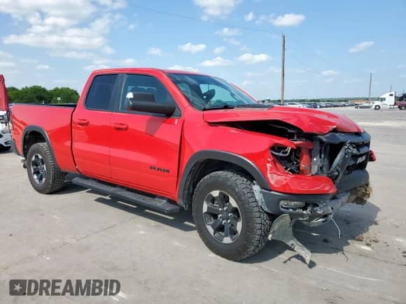 2020 Ram 1500 Rebel with VIN 1C6SRFET3LN115047, listed as a Copart auction lot 60078475 with 127,931 mi miles and Salvage title. Bid and sale history available at DreamBid. Image 4.