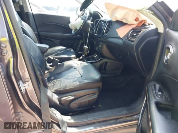 2020 Jeep Compass Limited with VIN 3C4NJCCB5LT114424, listed as a IAAI auction lot 43164924 with 99,096 mi miles and . Bid and sale history available at DreamBid. Image 5.