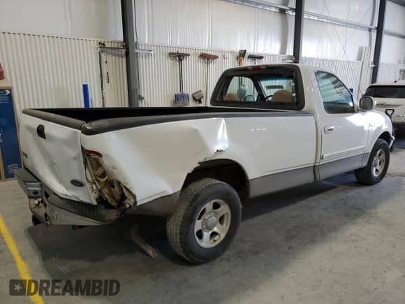 2001 Ford F-150 XL with VIN 1FTRF17W31NA23928, listed as a Copart auction lot 42345325 with 164,319 mi miles and Salvage title. Bid and sale history available at DreamBid. Image 3.