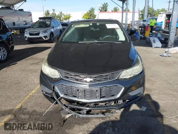 2017 Chevrolet Cruze LS z VIN 1G1BC5SM6H7231414, wystawiony jako IAAI lot #43243439 z przebiegiem 114 050 mil mil oraz . Historia ofert i sprzedaży dostępna na DreamBid. Obrazek 13.