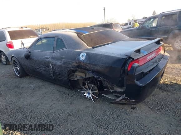 2013 Dodge Challenger R/T с VIN 2C3CDYBT1DH501055, выставлен на аукционе IAAI как лот 41424579 с пробегом 156 492 миль миль и . История ставок и продаж доступна на DreamBid. Изображение 3.