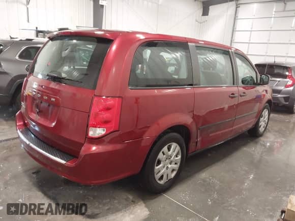 2014 Dodge Grand Caravan SE 30th Anniversary with VIN 2C4RDGBG7ER340869, listed as a IAAI auction lot 42050694 with 117,337 mi miles and . Bid and sale history available at DreamBid. Image 4.