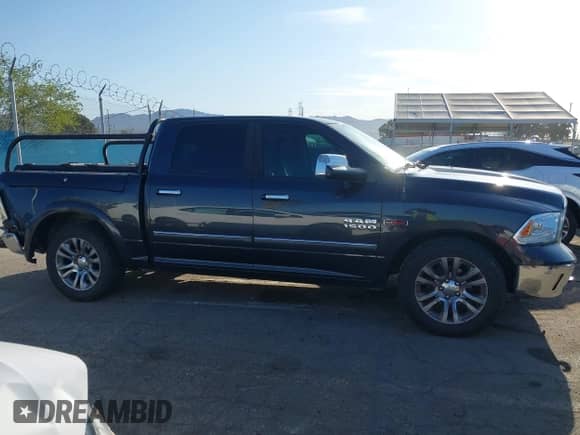 2015 Ram 1500 Laramie Longhorn с VIN 1C6RR7PM5FS714242, выставлен на аукционе IAAI как лот 41831312 с пробегом 130 616 миль миль и . История ставок и продаж доступна на DreamBid. Изображение 13.